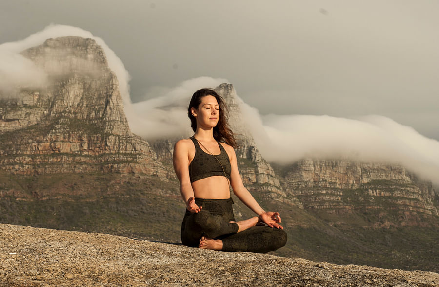 Person trying out various meditation benches